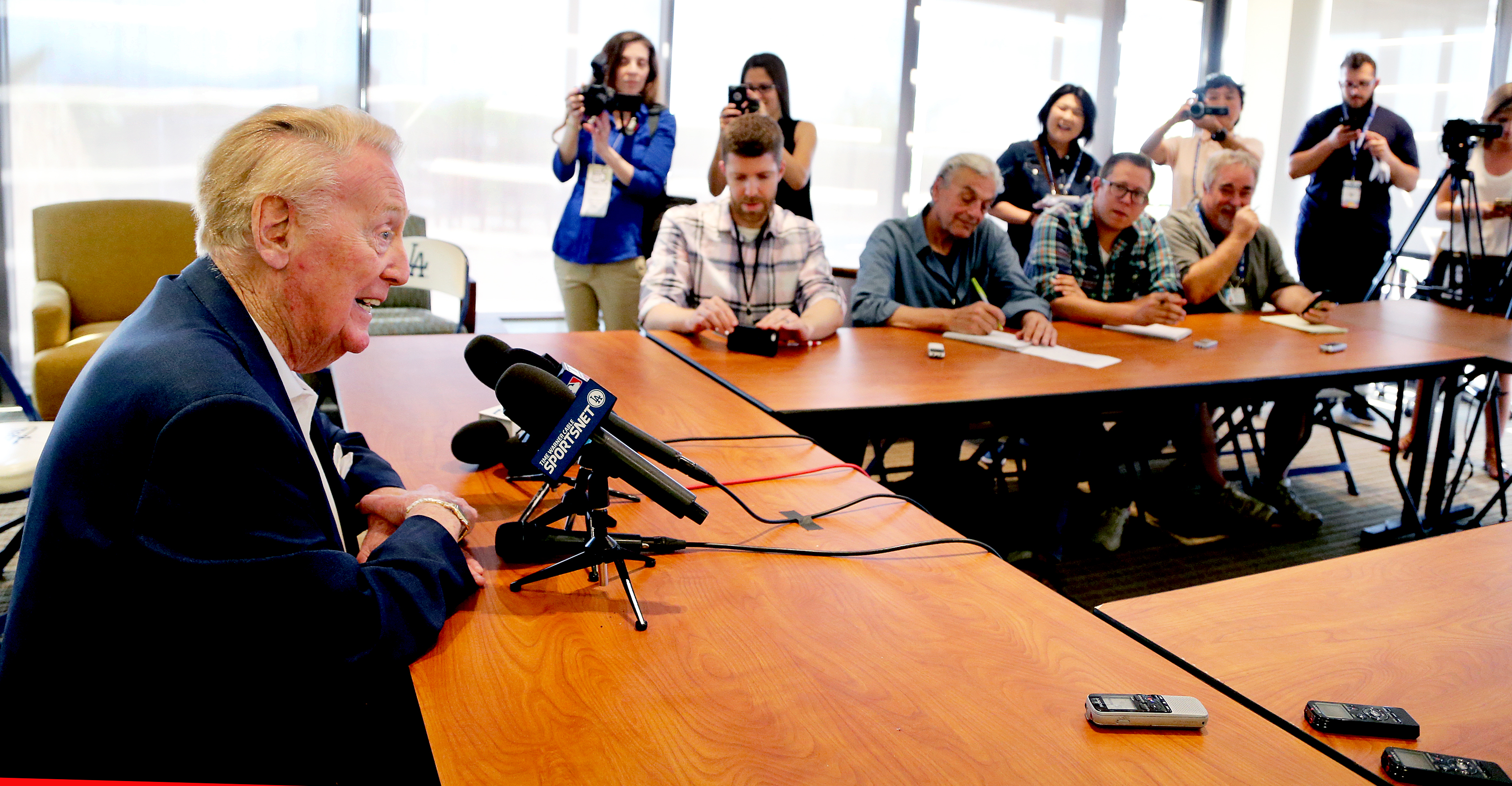 Retiring Vin Scully, the voice of generations, says farewell to