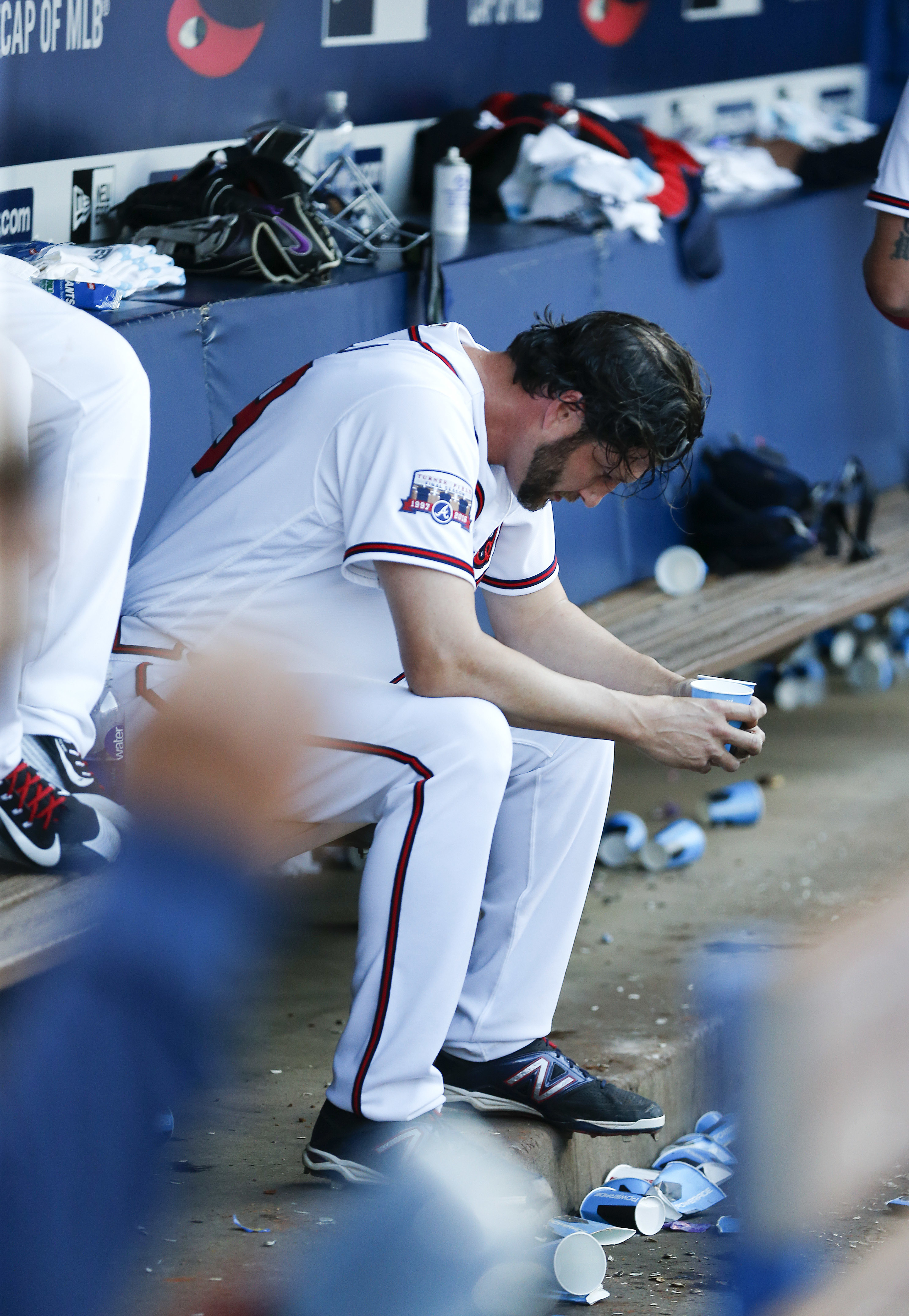 Atlanta Braves' Gordon Beckham throws out a St. Louis Cardinals