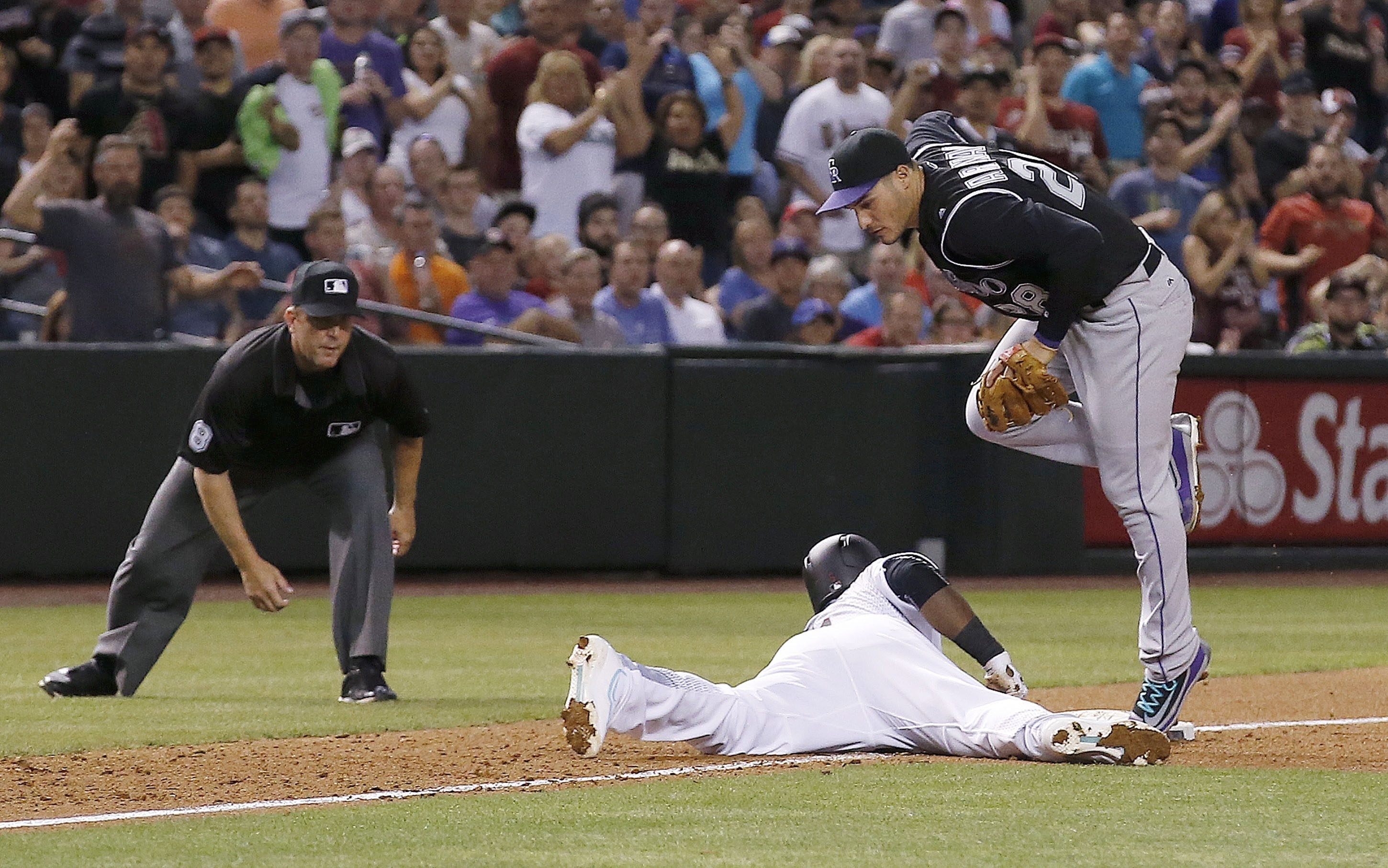 Rockies waste big inning and lose 11-6 to Diamondbacks