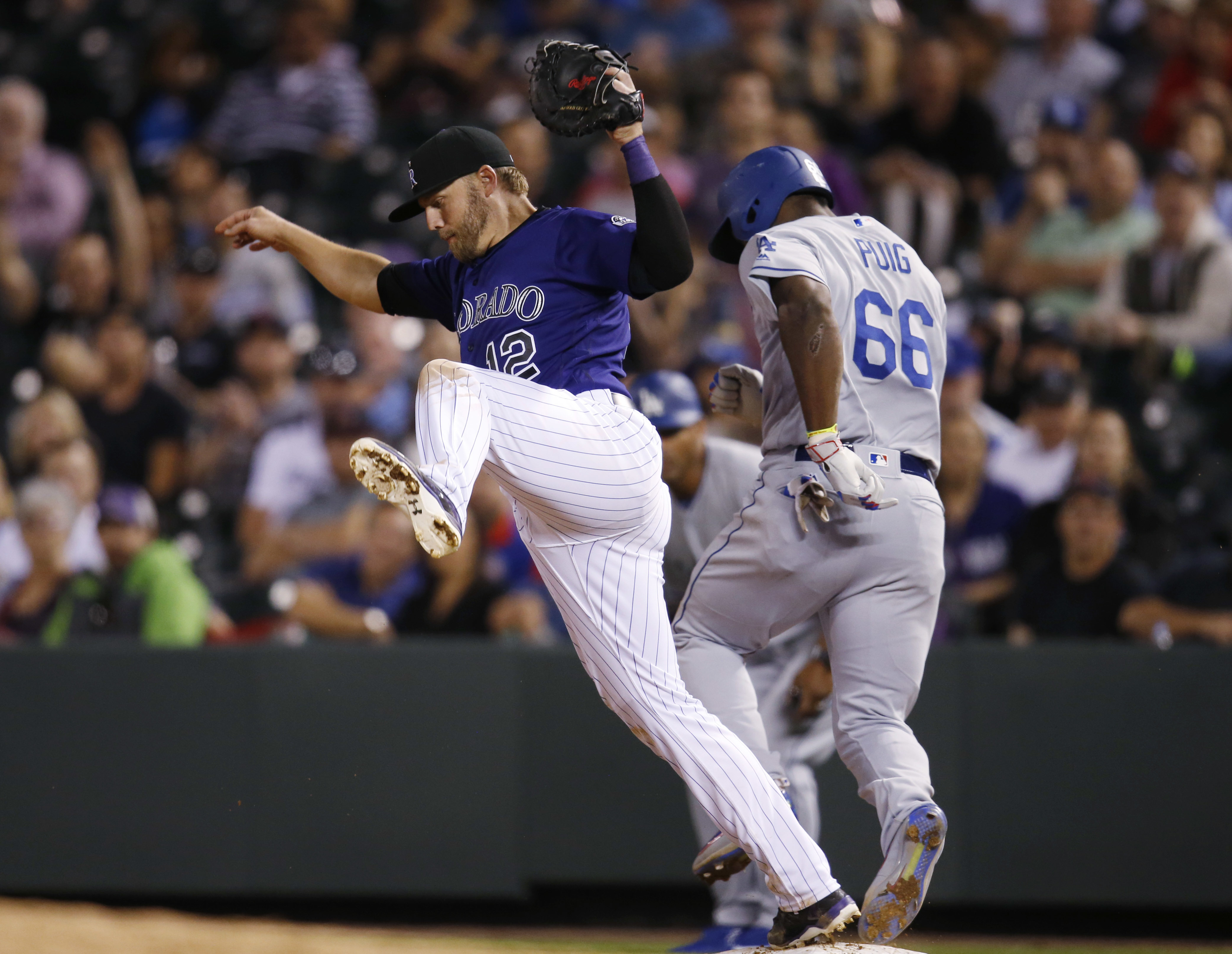 Colorado Rockies Trevor Story, Jon Gray and Mark Reynolds share