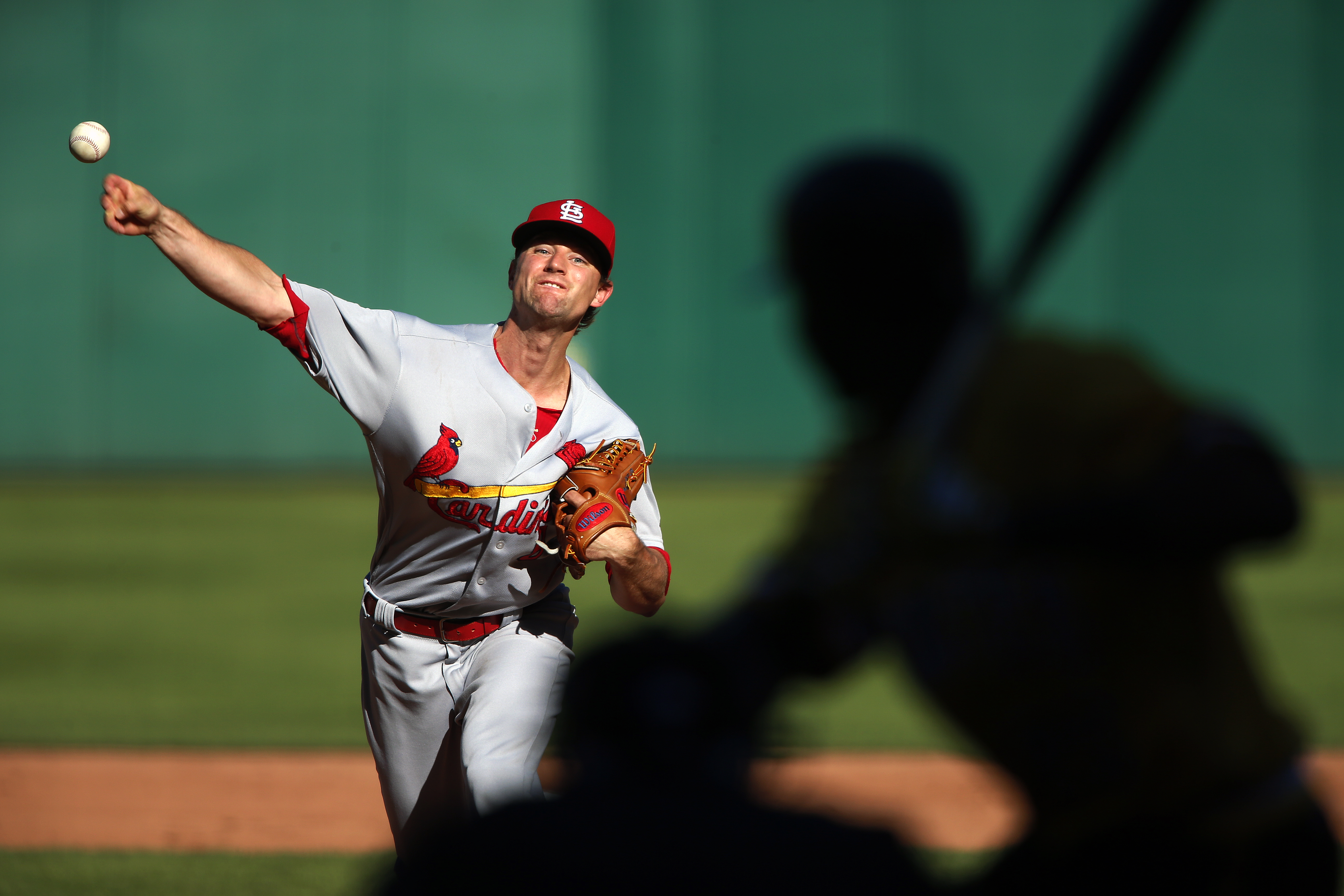 Carpenter, Holliday send Cardinals to win over Pirates in 12 innings