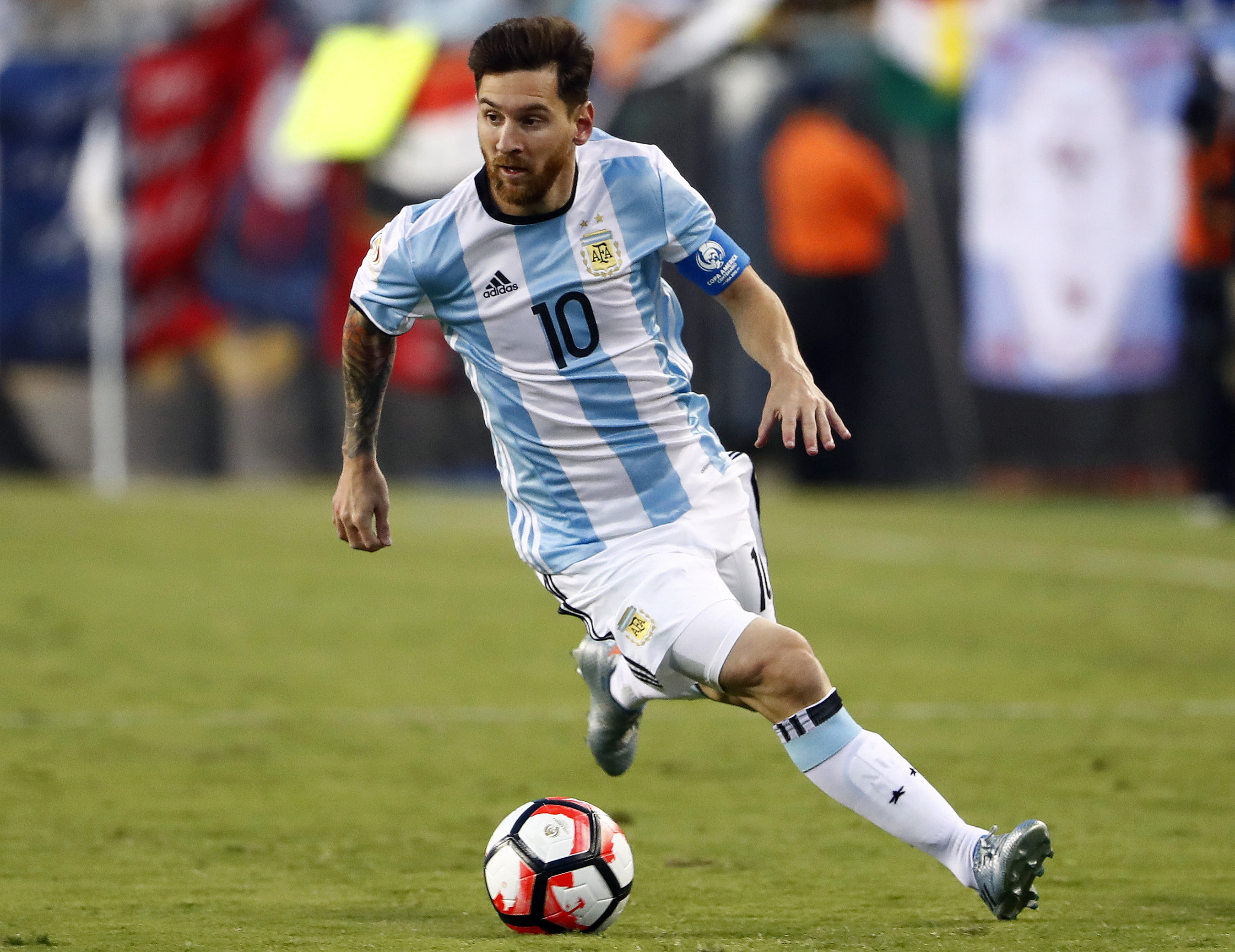Argentina's Lionel Messi the obstacle in front of USA's Copa America