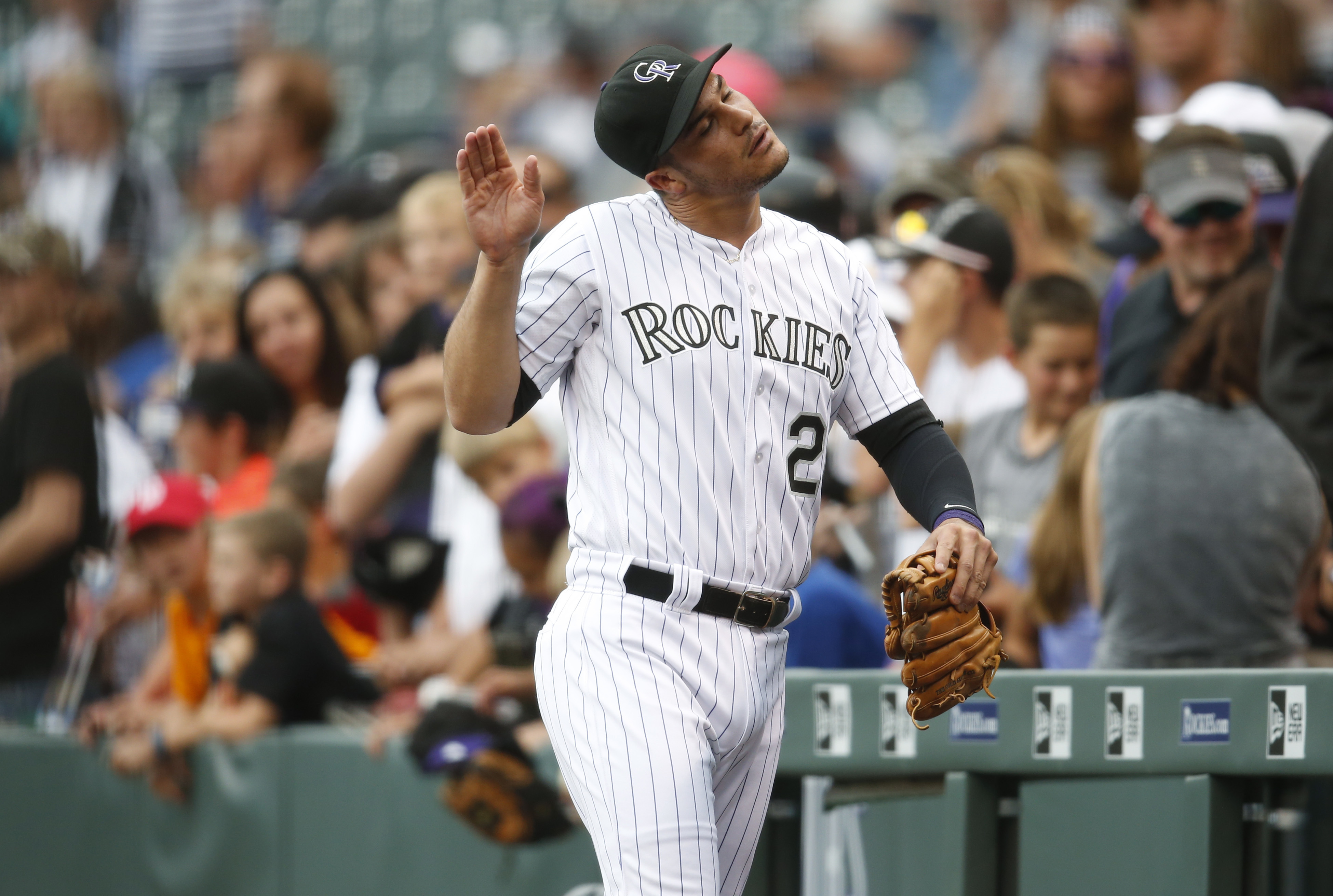 Rockies fold in ninth, give up lead to Texas