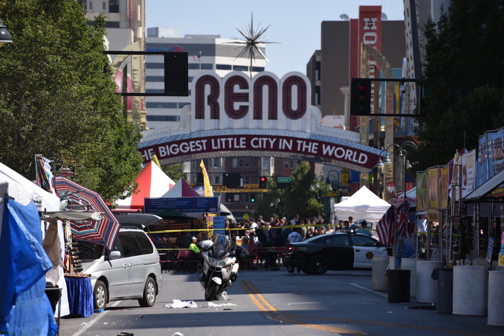 Minivan crashes into Reno Wing Fest booth, driver shot dead