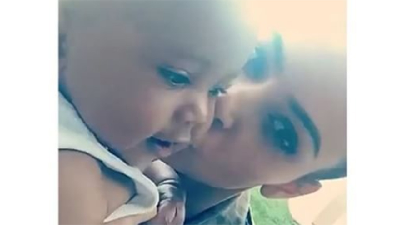 Kim Kardashian Smothers Saint West With Kisses On Snapchat 