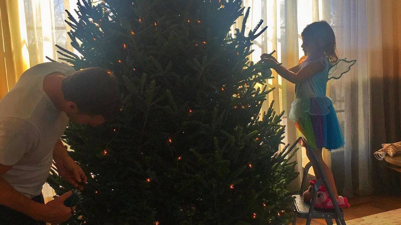 Tom Brady and Daughter Vivian Decorating a Christmas Tree Will