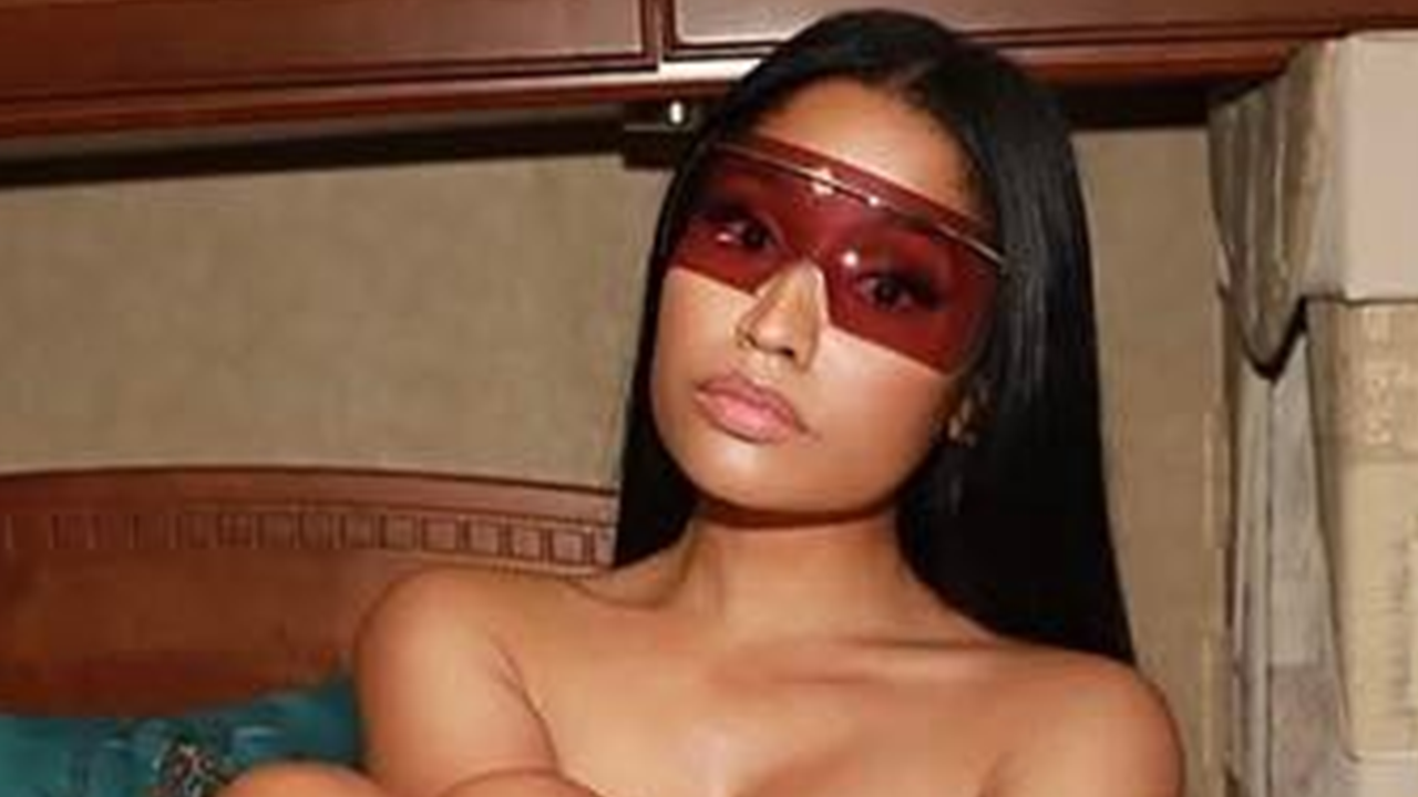 Nicki Minaj Poses Topless in Chanel Boots -- See the Sexy Pic