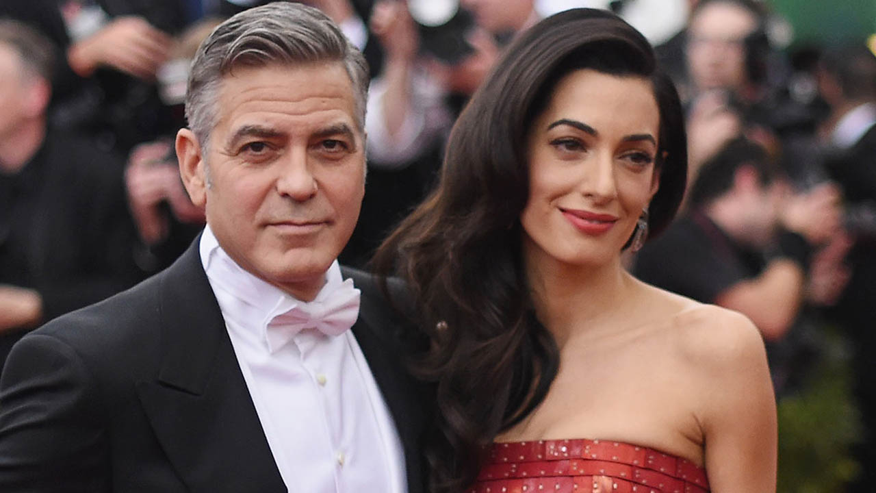 Clooney Says He and Amal Will Avoid Traveling to Dangerous(00)