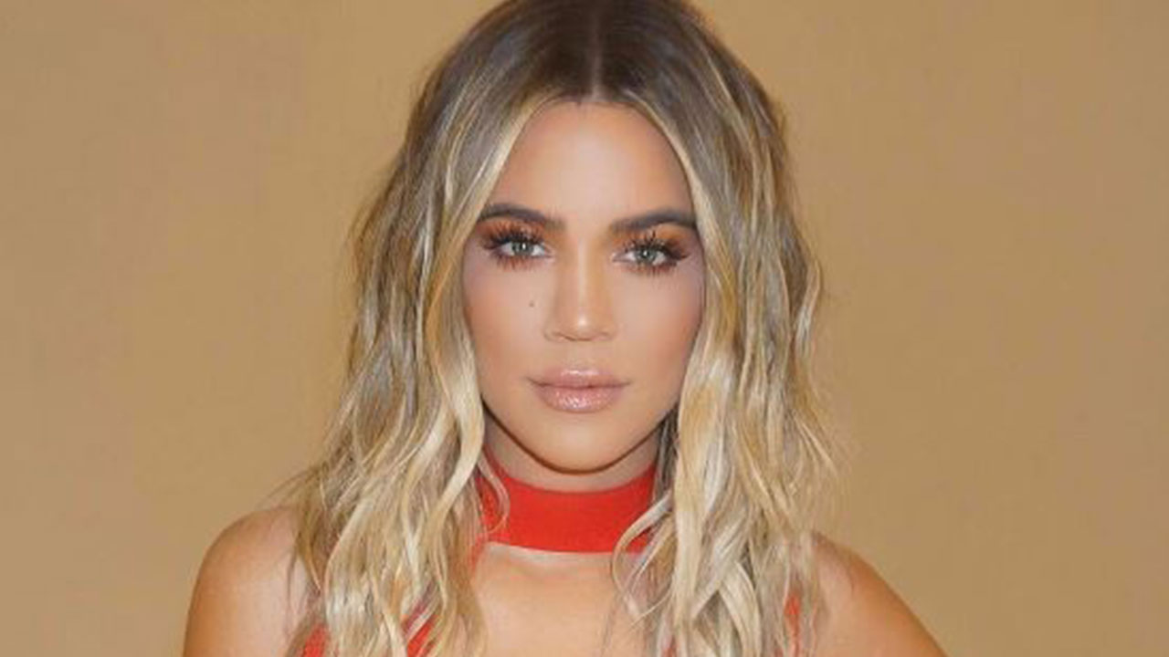 Khloe Kardashian Wears a Red Hot Dress for International Women's Day