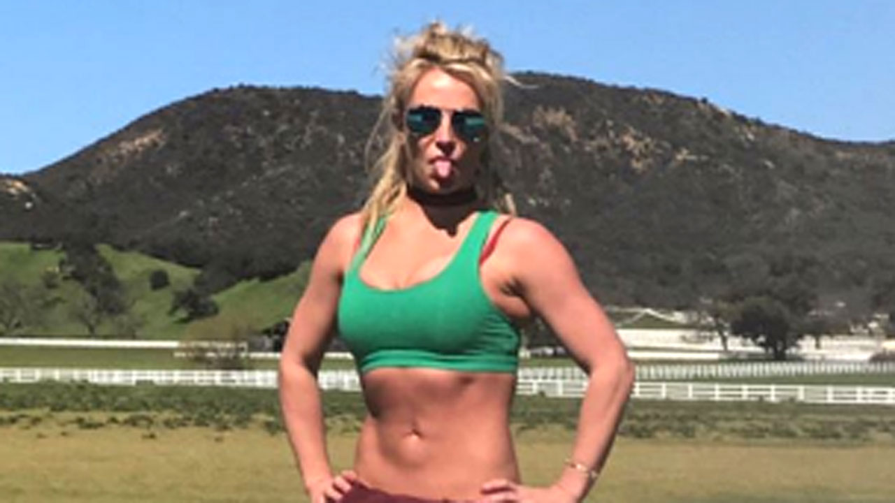 Britney Spears Flaunts Bikini Bod As She Rolls Around In The Sand