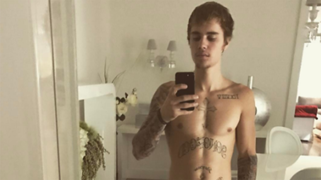 Justin Bieber Gets Giant Eagle Tattoo on Stomach, Sweetly Dances Shirtless  With Older Female Fan 