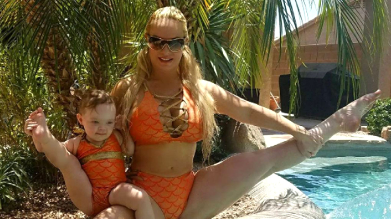 Coco Austin strikes a pose with her mini-me daughter Chanel as the