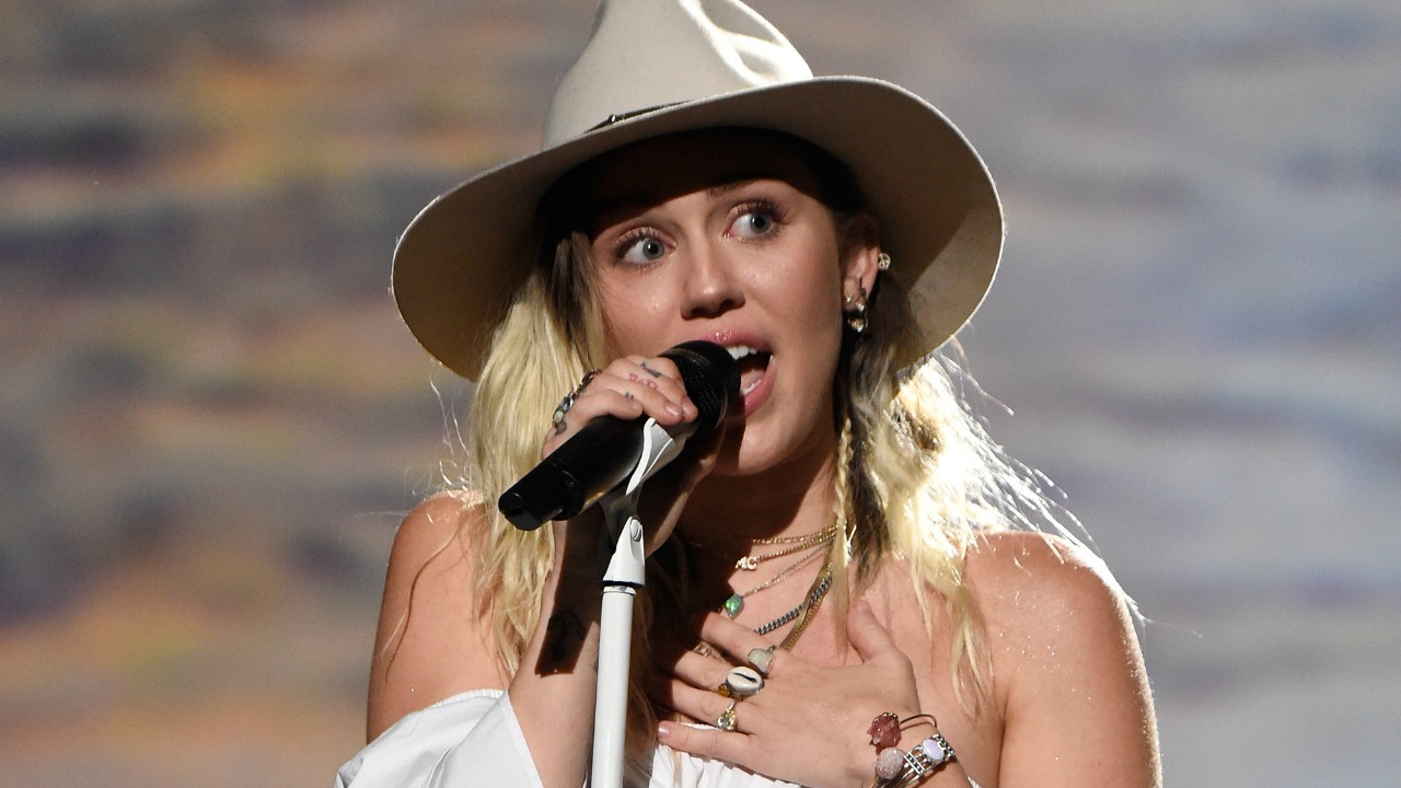 Miley Cyrus Gets New Sunflower Tattoo to Declare She's a 'Vegan for