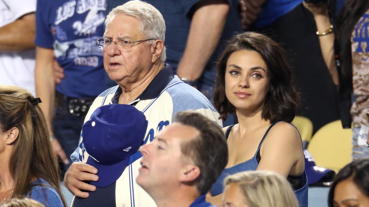 Mila Kunis wears pretty camisole as she catches a Dodgers game
