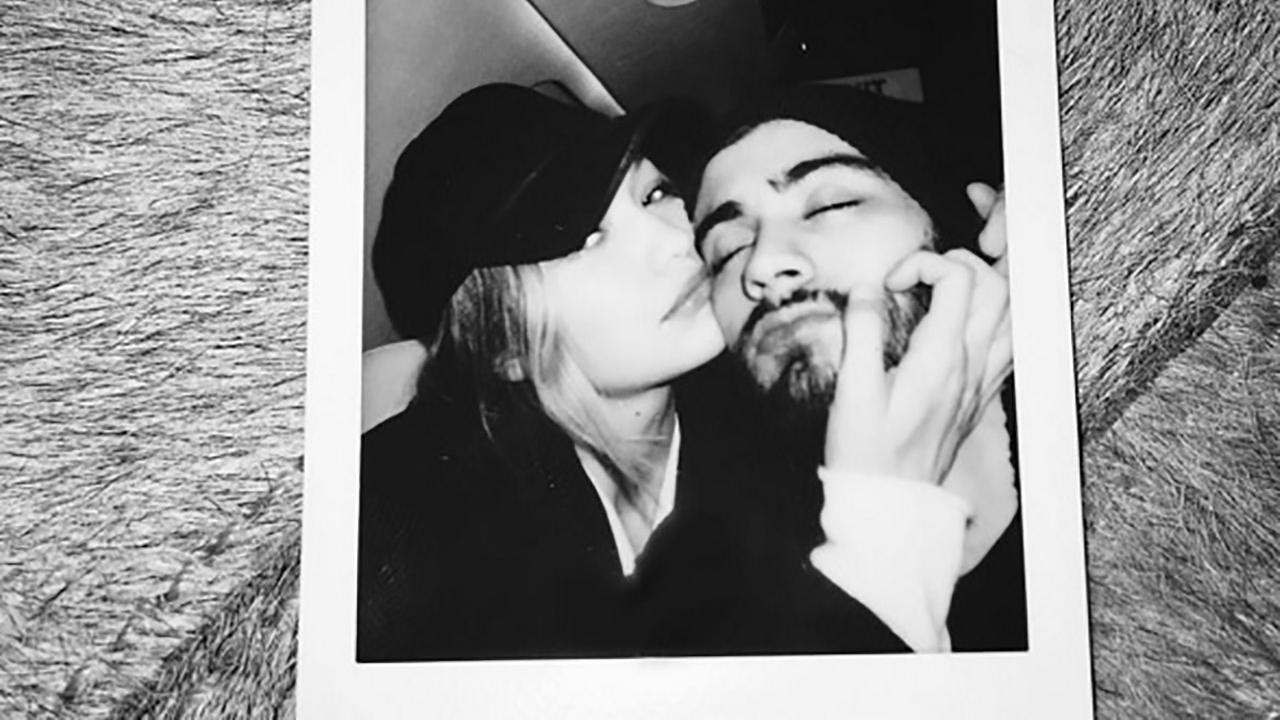 Gigi Hadid And Zayn Malik Celebrate Their 2 Year Anniversary With A Kiss 